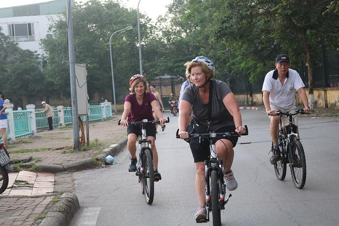 Half-Day Bicycle Tour Combine City & Countryside + Train Street - West Lake on a Bike: Contrasts Without the Hassle