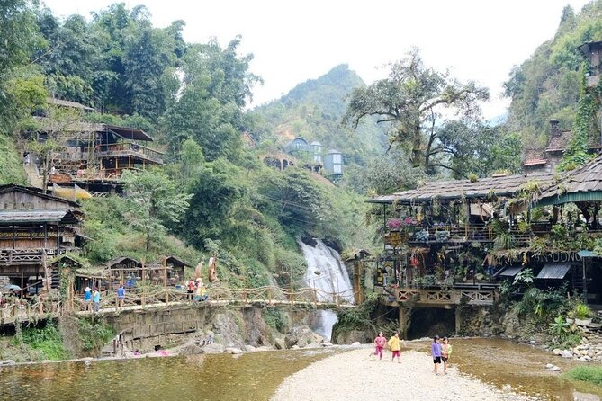 Half Day Sapa Cat Cat Explore Waterfall, Workshop, H'mong Local - Stop 2 in Cát Cát Village: stilt houses, crafts, and Tiên Sa Waterfall
