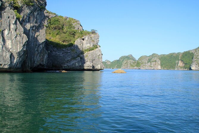 Halong Bay 2 Day Cruise Including Transfer from Hanoi - Day 2 at 6:00 a.m.: Tai Chi on the sundeck and the Luon Cave area cruise