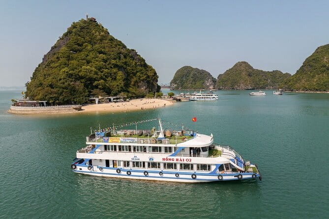 Halong bay 4 hours boat tour from Halong city with 2 caves, kayak - Dau Go cave: less lit, more wandering space for your pace
