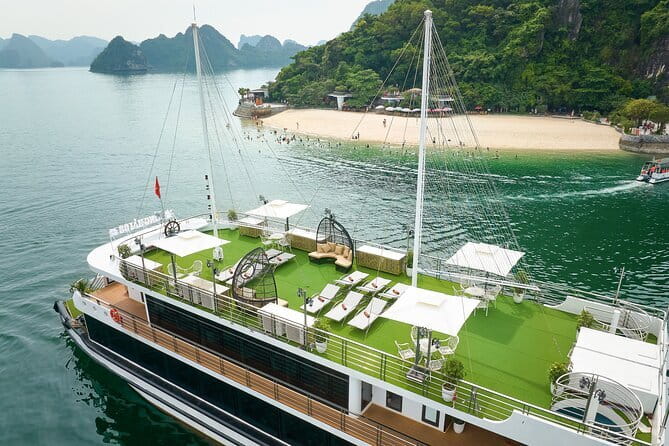 Halong Bay 5-Star Day Cruise, Buffet Lunch, Cave, Kayak, Transfer - Returning on the Sundeck: Sunset Party and Vietnamese Tea