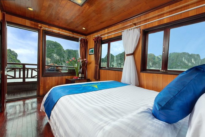 Halong bay boutique cruise 2 days trip: Kayaking, swimming & caving tours - Boarding and first impressions: welcome drinks, cabin check-in, and a real safety briefing