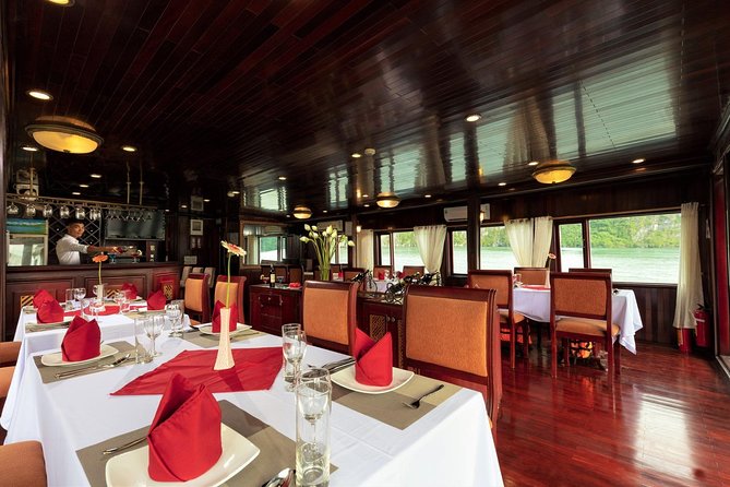 Halong bay boutique cruise 2 days trip: Kayaking, swimming & caving tours - Day 1 in Ha Long Bay: Surprising Cave and Titop Island, then spring rolls and sunset party