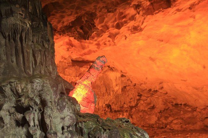 Halong Bay Cruise Day Trip: Titop island, Surprise cave, Swimming, Kayaking - Surprise Cave: the “walk-in” highlight