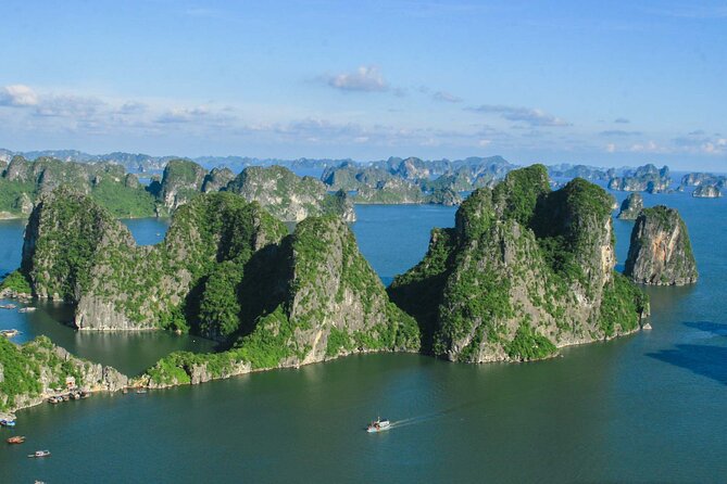 Halong Bay Cruise Luxury 1 Day Tour - Halong Bay sights: islets, cave time, and the water activity stop