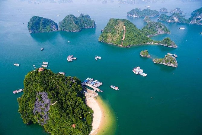 Halong Bay Full Day Tour with All-Inclusive: Boat, Kayak, Island, Cave and Lunch - Titop Island: a quick viewpoint break