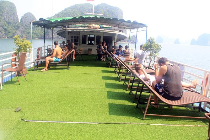 Halong bay full day trip: Visit Surprise cave, Titop island, kayaking & swimming - Luon Cave: kayaking or bamboo boat through the tunnel-cave area