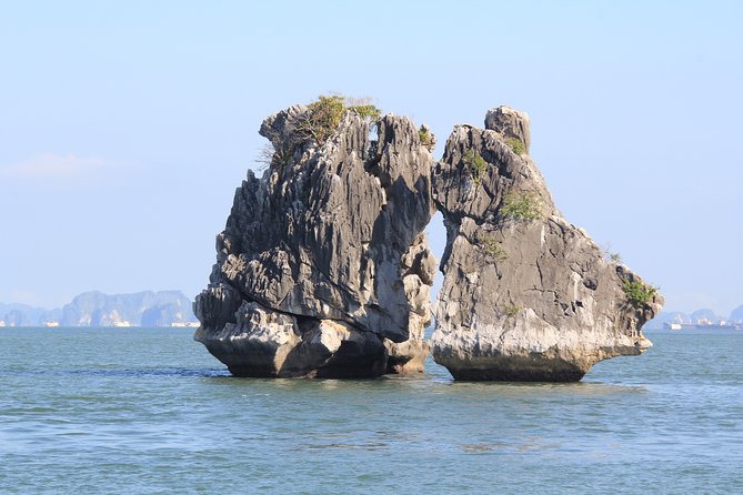 Halong bay full day trip: Visit Surprise cave, Titop island, kayaking & swimming - Tickets and real costs: what you’ll pay beyond the headline price