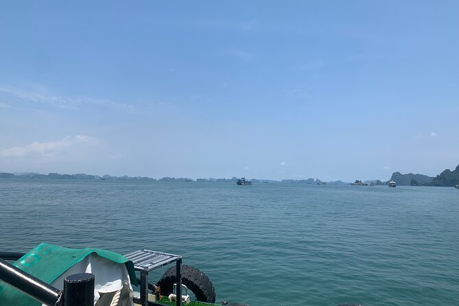 Halong Bay Full Day With 5 Star Cruise - Buffet Lunch - TiTop Island: beach break, or climb for the view