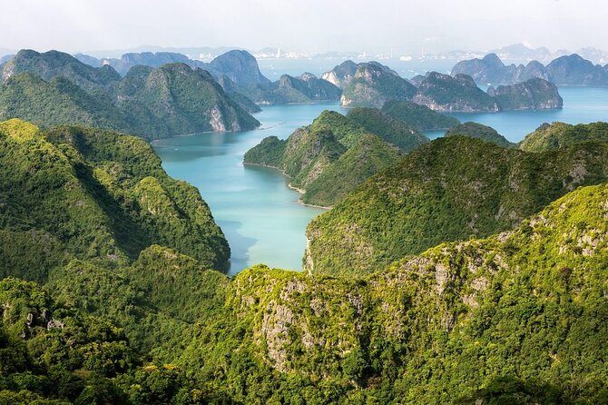 Halong Bay Full Day With Cave, Kayaking And Swimming - Hanoi pickup at the Opera House: confirm early, then expect the road