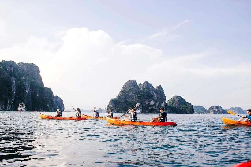 Halong Bay Luxury Cruise: Kayak&Swim,Cave, Party BEST SELLER - Titov Island: swim or climb for views over Halong Bay