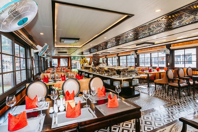 Halong bay Luxury Cruise Trip: Titop Island, Amazing Cave & Kayak - Sunset party on the return: tea, cakes, fruit, and music on the upper deck