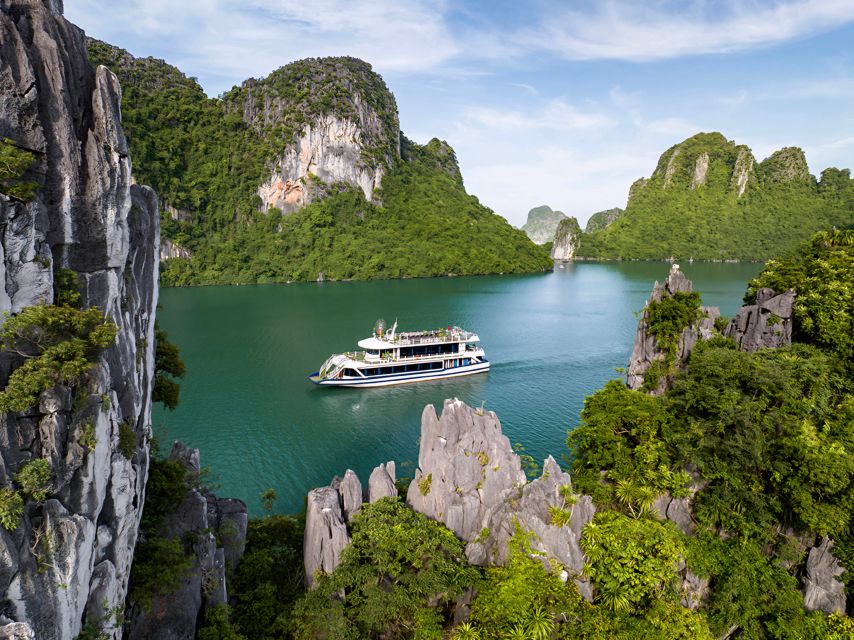 Halong Bay Luxury Cruise with Kayaking & Lunch Buffet - Sunset party: the tea, fruit, cake, and the best moment to breathe