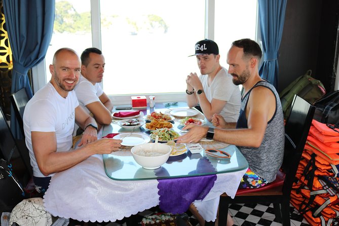 Halong Day Tour: Islands, Cave, Kayak. Lunch. Transfers - Ba Hang Fishing Village: A Quiet Counterpoint Near the Cave Area