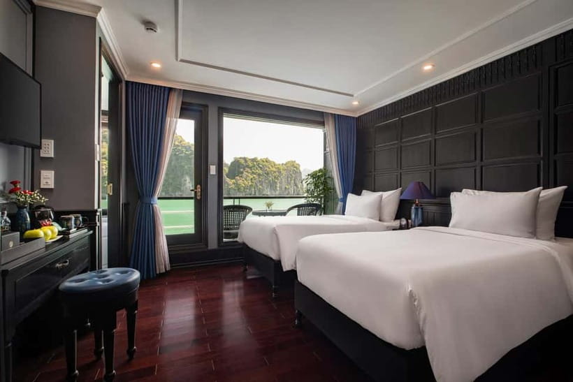 Hanoi: 2-Day Halong-Lan Ha Bay BEST SELLER 5<em> cruise balcony – Key things I’d zero in on’ /></p>
<ul>
<li><strong>Private balcony cabin</strong> on a junior suite setup, so your best views don’t require standing around</li>
<li><strong>Kayak + caves + swim stops</strong> packed in, with options that shift based on tide</li>
<li><strong>Spring roll cooking class</strong> on board, timed around the golden-hour mood</li>
<li><strong>Sunrise tai chi</strong> on the bay, then more outdoor time the next morning</li>
<li><strong>Night squid fishing</strong>, a very Vietnam-style add-on beyond the usual photos</li>
<li><strong>Onboard organization and staff care</strong>, including anniversary support mentioned by name in reviews</li>
</ul>
<h2 id="hanoi-to-halong-lan-ha-how-the-trip-really-flows">Hanoi to Halong-Lan Ha: how the trip really flows</h2>
<p><img width="820" height="547" decoding="async" src=