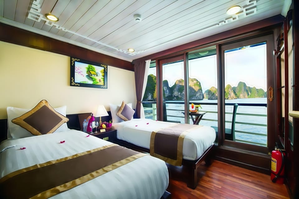 Hanoi: 2D1N Ha Long Bay by Le Journey Cruise - Day 1: Sung Sot Cave, Ti Top Island, and a Sunset Party That Includes Cooking