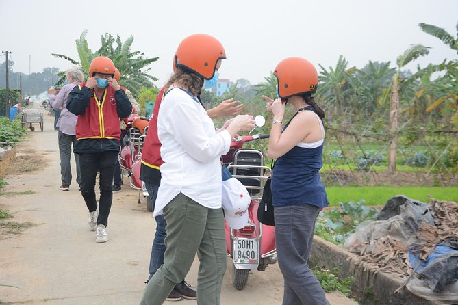 Hanoi Back Street Vespa Tours: Full Day Vespa Tours - Dong Anh home visit: tea, candy, and conversation with a translator