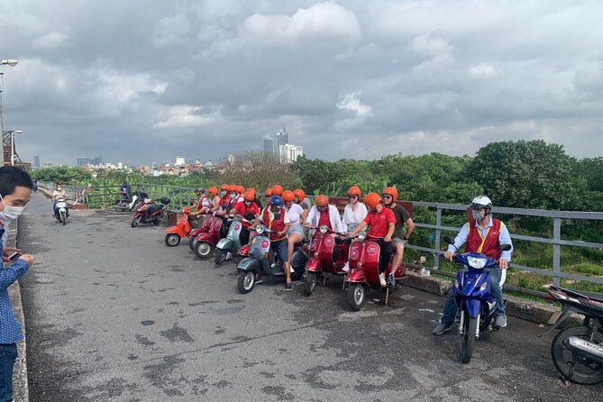 Hanoi Back Streets Vespa Tours: Hanoi Insider Vintage Vespa Tour - Duong Tau and the Reunification train track: close enough to feel it