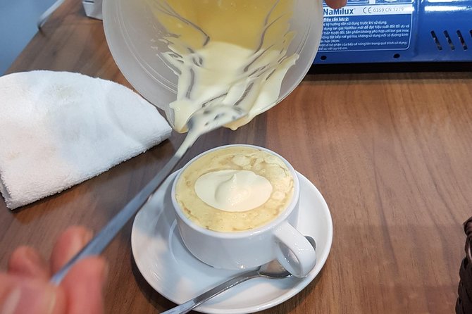 Hanoi daily egg coffee making course with local guide - One sample cup: watching egg coffee technique come together