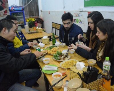 Hanoi: Food and Sightseeing Motorbike Tour with 7 Tastings - Getting started in Hanoi: pickup, gear, and a West Lake photo breather