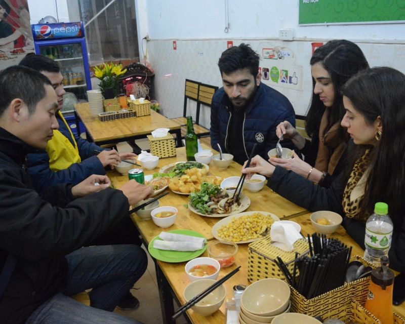 Hanoi: Food and Sightseeing Motorbike Tour with 7 Tastings - Getting started in Hanoi: pickup, gear, and a West Lake photo breather
