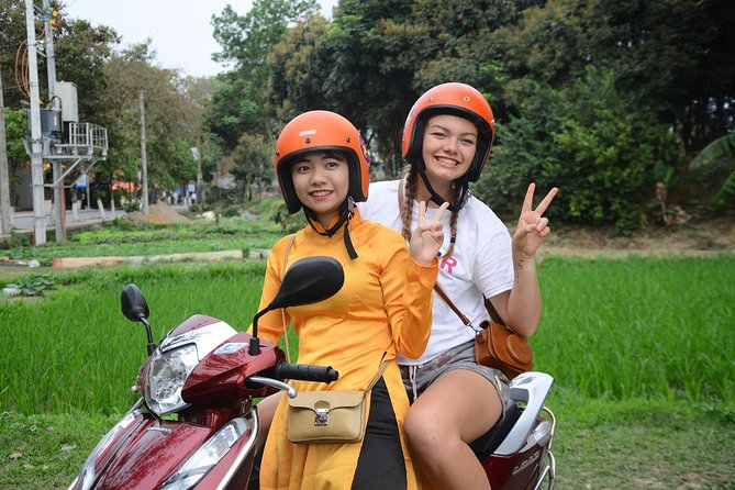Hanoi Motorbike Food Tours: Hanoi Motorbike Tours Led By Women - Stop 2: Long Biên Bridge and banh cuon at a local-favorite café