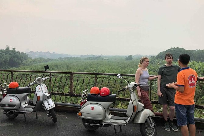 HANOI MUST SEE SITES Vespa Tour - B-52 Lake, Long Bien Bridge, and Duong Tau Train Street