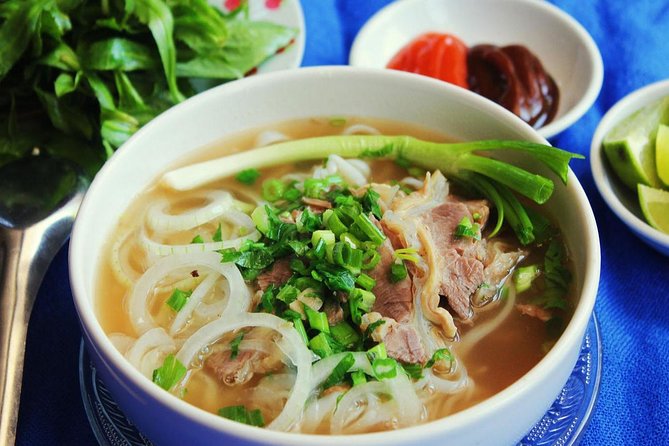 Hanoi Street Food Experience by Walking - Pho: the rice noodle soup that teaches you the rules