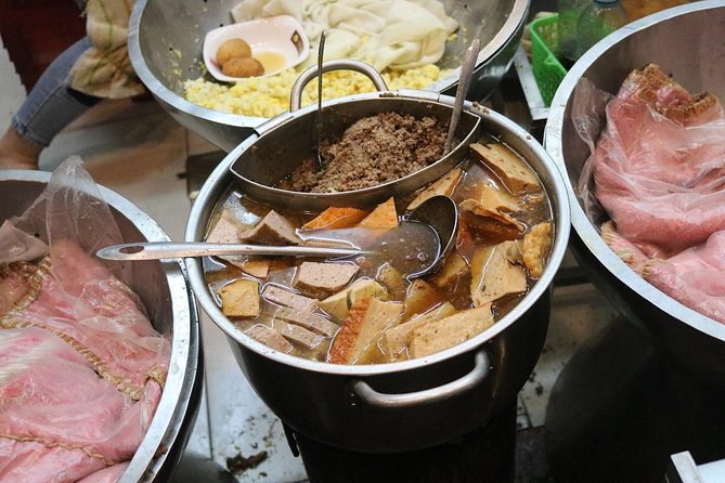 Hanoi Vespa After Dark Street food + Train Street+ Live Music - Stop 2: Hoàn Kiếm for bun chả and spring rolls