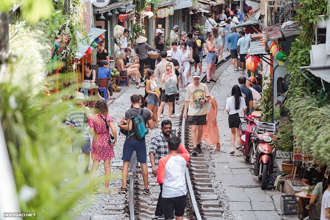 Hanoi Vespa After Dark Street food + Train Street+ Live Music - Stop 4: Long Biên Bridge views over the Red River