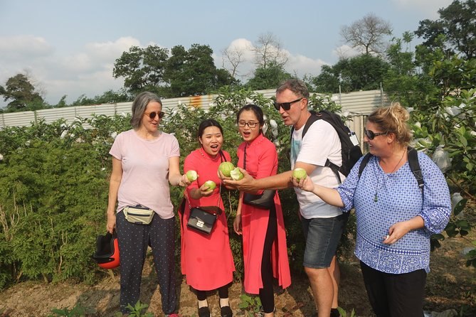Hanoi Vespa Full Day City & Countryside with Female Ao Dai Riders - Long Bien Bridge: first big river views on vintage Vespas