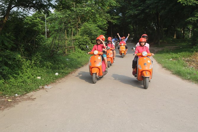 Hanoi Vespa Full Day City & Countryside with Female Ao Dai Riders - Co Loa Citadel and rice-paddy roads: market life plus countryside pace