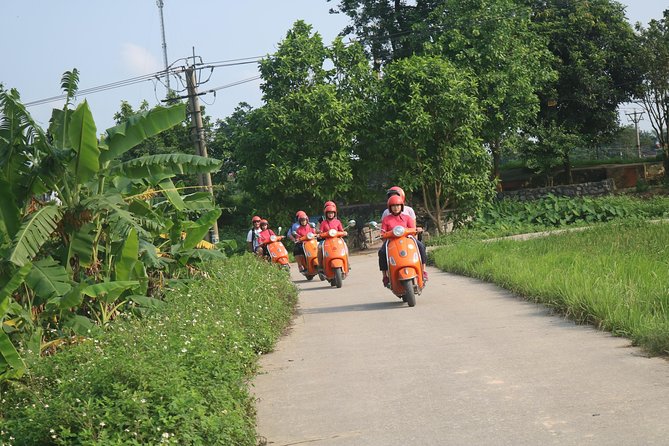 Hanoi Vespa Full Day City & Countryside with Female Ao Dai Riders - West Lake, botanical gardens, and Huu Hiep Lake’s B-52 crash site