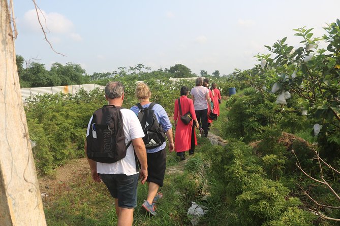 Hanoi Vespa Full Day City & Countryside with Female Ao Dai Riders - Duong Tau along the tracks: seeing life within inches of the rail line