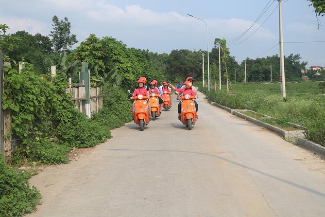 Hanoi Vespa Full Day City & Countryside with Female Ao Dai Riders - Ba Dinh Square and An Duong Market: monuments plus real food shopping