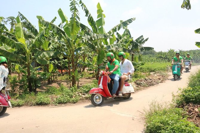Hanoi Vespa Tour Explore Red River Delta & Rural Villages 5 Hours - Long Bien Bridge Stop: Park, Stretch, and Learn a Hanoi Landmark