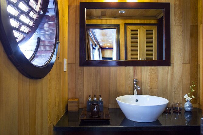 Hera Classic Cruise 2 Days 1 Night Halong Bay With BALCONY CABINS - Day 2 Starts Early: Tai Chi, Coffee, and the Cave Morning