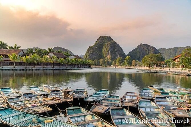 Hoa Lu Tam Coc 1 Day Group Tour (Biking- Boating-Cave Exploring) - Bamboo boat time on Tam Coc: the calm that people rave about