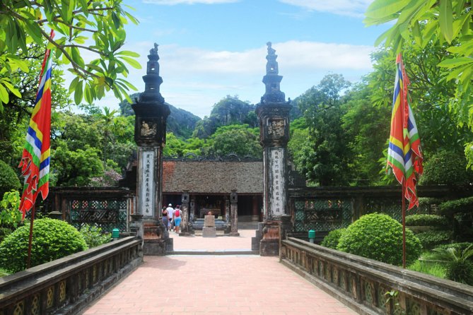 Hoa Lu - Tam Coc - Ninh Binh Day Tour: Biking, Visit Local Family - Tam Coc boat ride: caves, calm river time, and local rowers
