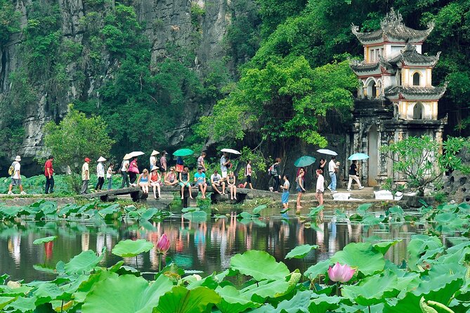 Hoa Lu - Tam Coc - Ninh Binh Day Tour: Biking, Visit Local Family - Cycling through rice fields: what you’re really doing in the morning