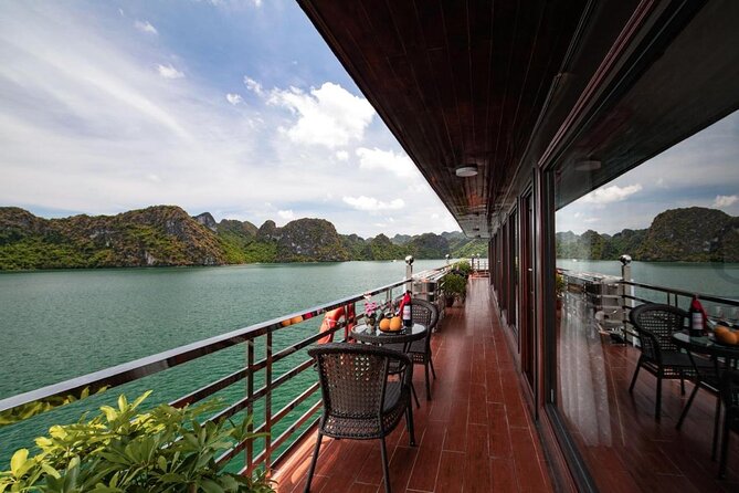 La Pandora Cruise Explore Ha Long Bay and Cat Ba Island 2 days 1 night on boat - Tai Chi on the sundeck and the sunrise you actually get to see