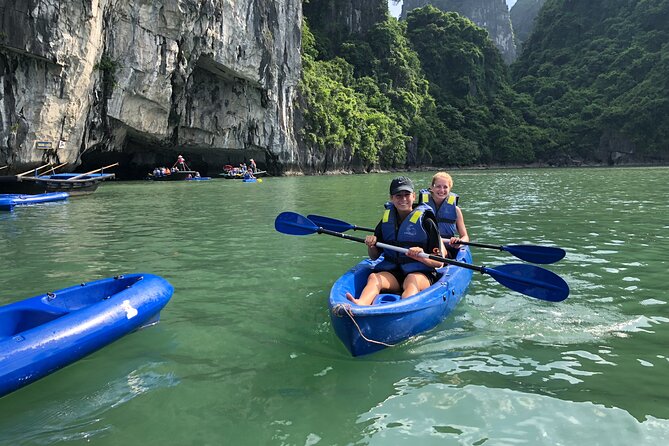 Lan Ha Bay Full Day With Cave, Kayaking And Swimming - Tra Bau Area: Kayaking Through Limestone Cliffs