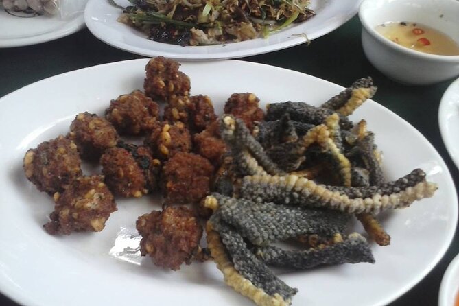 Le Mat Snake Village Tour With Snake Tasting - Safety and comfort: what the guide helps you manage
