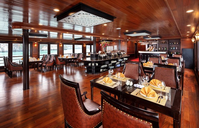 Luxury 4<em> Cruise 2Days 1night Ha Long Bay – V'spirit Premier Cruise – Key highlights you’ll actually care about’ /></p>
<ul>
<li><strong>Private balcony cabins</strong>: wake up and wind down with Lan Ha Bay views from your own space.</li>
<li><strong>Lan Ha Bay route (less crowded feel)</strong>: you get a Halong-style scenery fix without feeling locked to the most famous stops.</li>
<li><strong>Dark & Bright cave adventure</strong>: a short sampan ride through caves that also include swimming time.</li>
<li><strong>Tai Chi on the top deck</strong>: a sunrise start that’s peaceful and easy to join.</li>
<li><strong>Tra Bau kayaking plus fishing-farm visit</strong>: hands-on water time followed by real local life on the water.</li>
<li><strong>Chef cooking demonstration</strong>: you don’t just eat Vietnamese food—you get a guided look at what’s behind it.</li>
</ul>
<h2 id="lan-ha-bay-not-the-usual-halong-script">Lan Ha Bay, not the usual Halong script</h2>
<p><img width="669" height="446" decoding="async" src=