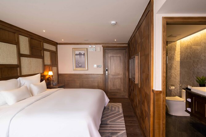 Luxury 5-Star Ha Long Bay Day Cruise with Buffet Lunch from Hanoi - Titop Island: Beach Time and the View From the Top
