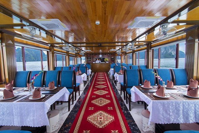 Luxury Halong Bay 1 Day on Cruises From Hanoi with Bus & Lunch - Sunset deck party with cake, fruit, and afternoon tea