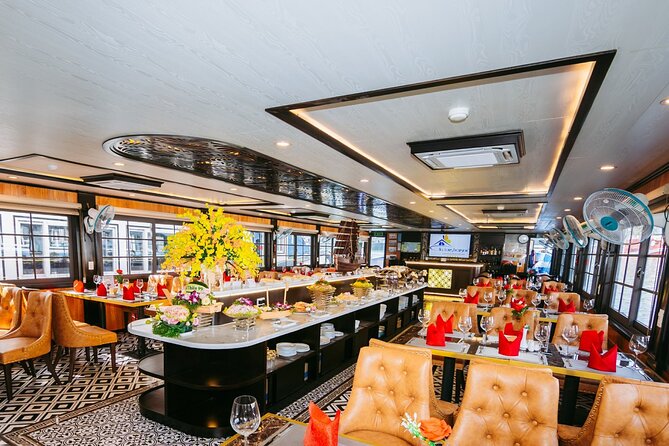 LUXURY Halong Bay Cruise 5 Stars Full Day Tour with Buffet Lunch - Sunset Party Onboard: Wine, Tea, Fruits, and the Calm After the Climbing