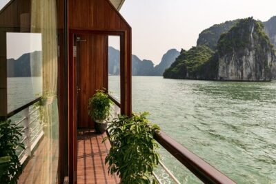 Mila Cruises 2 Days Explore Halong Bay from Hanoi - Day 1 on Mila Cruises: check-in, Sung Sot Cave, and sundeck sunset time