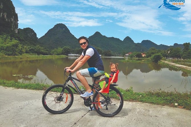 Mua Cave - Tam Coc - Bich Dong Day tour with transfer, local family & bike - Tam Cốc and the Ngo Dong River: slow time on purpose