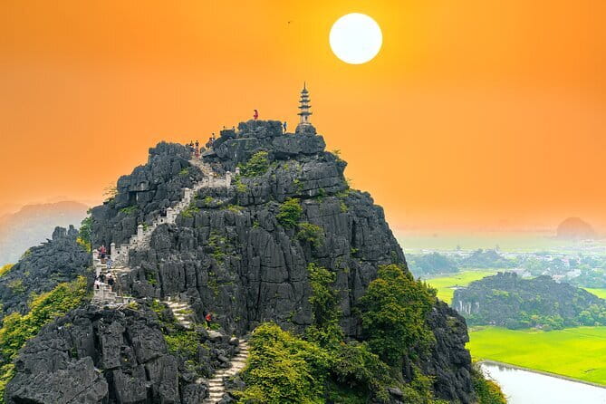Multi Day Tour in Ninh Binh and Halong from Hanoi - Day 1 in Ninh Binh: Hoa Lu temples, Trang An boat caves, and Mua Cave stairs